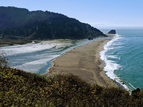 image of a sand bar at the mouth of an estuary